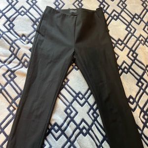Skinny black dress pants.